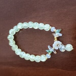 Elegant Beaded Bracelet with Floral Accent
